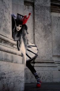 Flamboyant costumed model on San Gorgio island